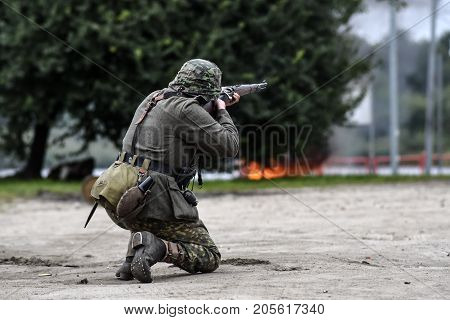 Gryfino Poland 23 september 2017: Historical reconstruction of the battle at Arnhem a German soldier aiming with a rifle.