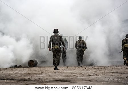 Gryfino Poland 23 september 2017: Historical reconstruction of the battle at Arnhem German soldiers in a cloud of smoke.