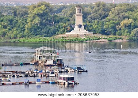 The Entrance To The Volga-don Canal From The Volga River , With Views Of The Lighthouse And A Statue