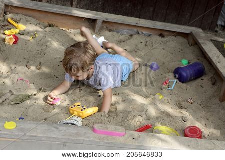 Child In Sandbox