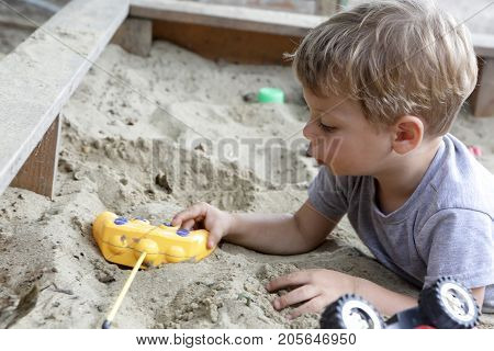 Kid In Sandbox