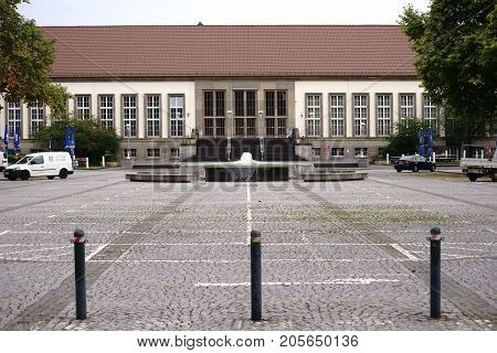 MAINZ, GERMANY - OCTOBER 24: The Hans Klenk Fountain on the grounds of the Johannes Gutenberg University in front of the Aula on October 24, 2017 in Mainz.