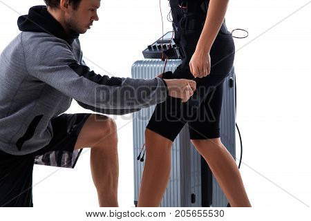 Trainer Helps Attaching Ems