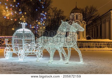 Belgorod Russia - January 8 2017: LED light horses with a carriage decoration composition in New Year's Cathedral Square Belgorod city.