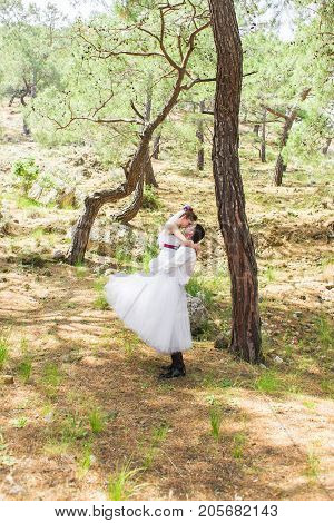 Romantic dating. Young loving couple embracing on nature.
