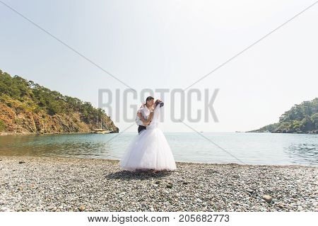 Romantic dating. Young loving couple embracing on nature.