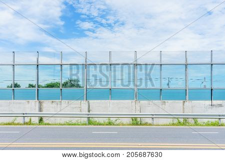 Plastic noise barrier road and guarding rail blocking the road