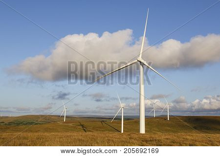 Group of five wind turbines in the Countryside