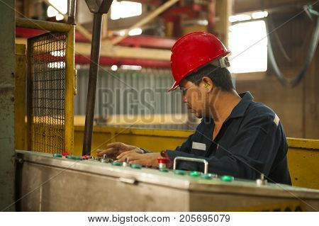 Padaeng industry Mae Sot Tak Thailand February20 2013 : Zinc mine. engineer control machine in factory.