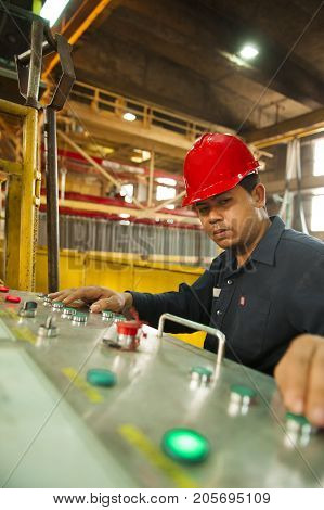 Padaeng industry Mae Sot Tak Thailand February20 2013 : Zinc mine. engineer control machine in factory.