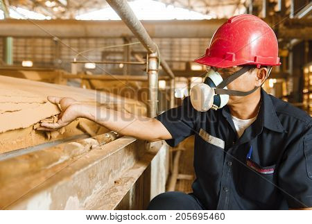 Padaeng industry Mae Sot Tak Thailand February20 2013 : Zinc mine. Engineer quality check mineral's.