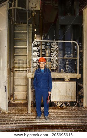 Padaeng industry Mae Sot Tak Thailand February20 2013 : Zinc mine. Portrait of engineer and his workplace.