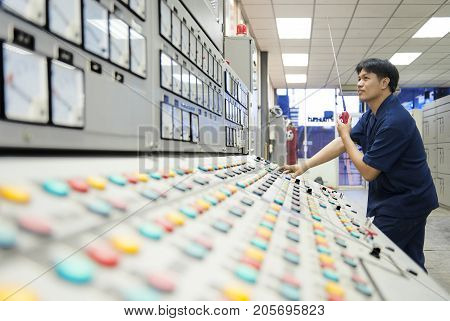 Padaeng industry Mae Sot Tak Thailand February20 2013 : Zinc mine. Engineer in control room.