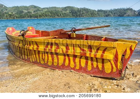 December 22 2014 Lagunas de Montebello National Park Mexico: colourful wood boat on the shore of the blue water of Cinco Lagos is popular with tourists