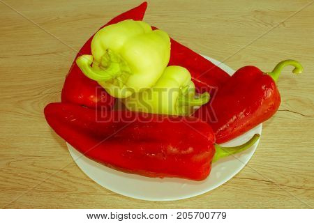 Red bell pepper backgro and Green Peppers. Fresh organic vegetables on table. Green and red bell pepper backgro - Retro color