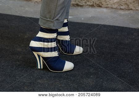 MILAN ITALY - SEPTEMBER 21: Detail of shoes outside Fendi fashion show building during Milan Women's Fashion Week on SEPTEMBER 21 2017 in Milan.