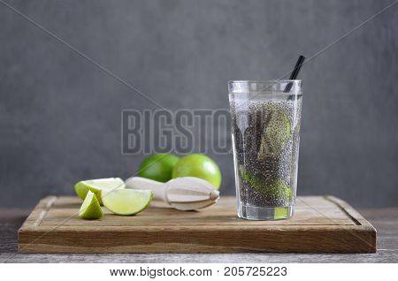 Chia fresca with lime juice simple recipe of super food cocktail for every day healthy eating routine, space for a text
