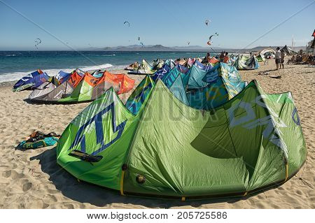 January 25 2014 Los Barriles Mexico: colourful kites lining up on the beach at the 'Lord of the Wind' surf kite competition
