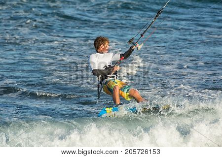 January 25 2014 Los Barriles Mexico: kiteboarder rides rough water at the 'Lord of the Wind' kite surf competition