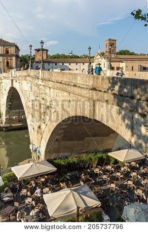 ROME, ITALY - JUNE 22, 2017: Amazing view of Tiber River and Pons Cestius in city of Rome, Italy