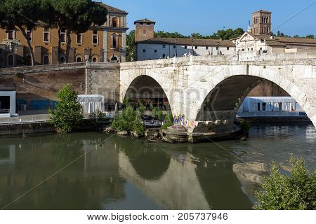 ROME, ITALY - JUNE 22, 2017: Amazing view of Tiber River and Pons Cestius in city of Rome, Italy