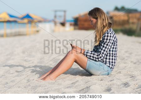 Beautiful girl holding a smartphone in the hands of a green screen green screen, hand of man holding mobile smart phone with chroma key green screen on white background, new technology concept