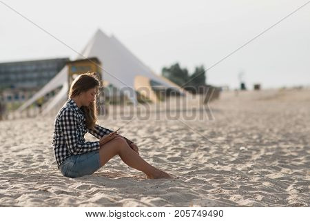 Beautiful girl holding a smartphone in the hands of a green screen green screen, hand of man holding mobile smart phone with chroma key green screen on white background, new technology concept