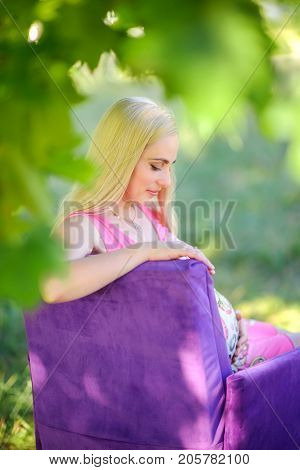 Happy Mother Waiting For The Child's Birth