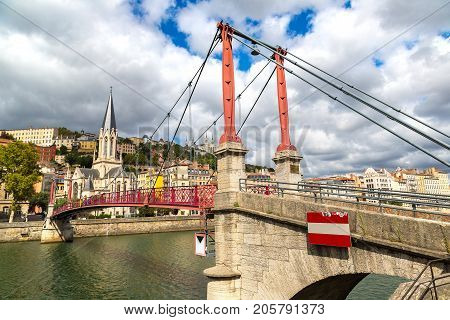 Pedestrian Saint Georges Footbridge And The Saint Georges Church In Lyon France In A Beautiful Summe