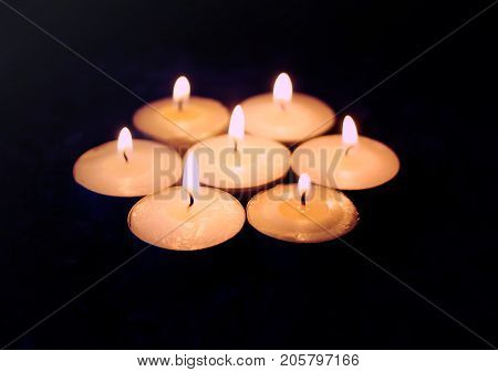 Burning Candles On Dark Background. Festive Composition.