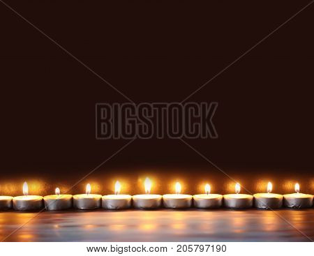 Burning Candles On Dark Background. Festive Composition.