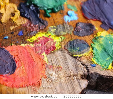 Mix of oil paints on handmade wooden palette.