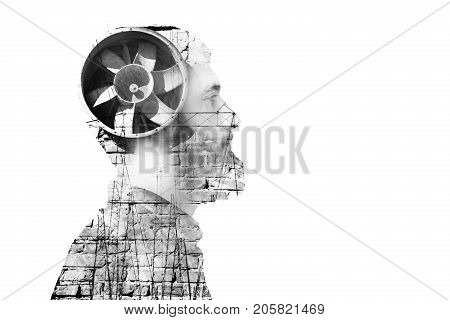 Portrait of young adult man in hood combined with abstract industrial fan and constructions Multiple exposure