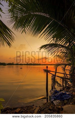 Vinh Cura Dai river in Hoi An Vietnam at sunset