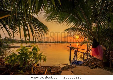 Vinh Cura Dai river in Hoi An Vietnam at sunset