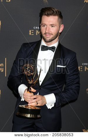 LOS ANGELES - SEP 9:  Travis Wall at the 2017 Creative Emmy Awards Press Room at the Microsoft Theater on September 9, 2017 in Los Angeles, CA