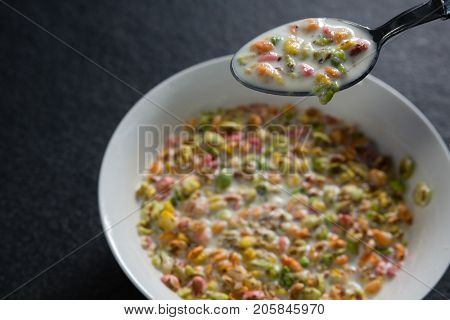 Close-up of cereal rings soaked in milk
