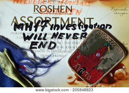 ILLUSTRATIVE EDITORIAL. Chevron of Ukrainian Army. With logo Roshen Inc. Trademark Roshen is property of Ukrainian president Poroshenko. MH17 flight investigation. Kiev,Ukraine.September 10, 2017