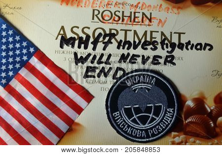 ILLUSTRATIVE EDITORIAL. Chevron of Ukrainian Army. With logo Roshen Inc. Trademark Roshen is property of Ukrainian president Poroshenko. MH17 flight investigation. Kiev,Ukraine.September 10, 2017