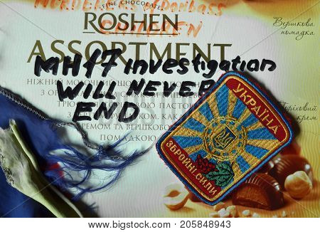 ILLUSTRATIVE EDITORIAL. Chevron of Ukrainian Army. With logo Roshen Inc. Trademark Roshen is property of Ukrainian president Poroshenko. MH17 flight investigation. Kiev,Ukraine.September 10, 2017