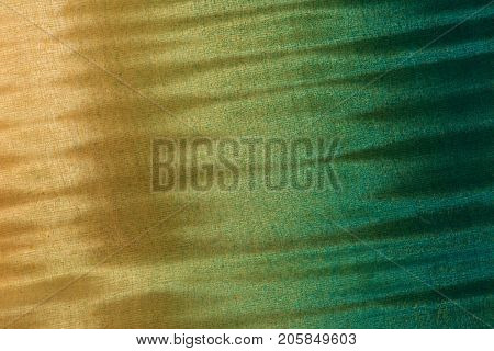 Finished wood surface with beautiful figured grain.Wood has tiger stripe or curly stripe grain. colored with translucent blue dye and lacquer top coat.??