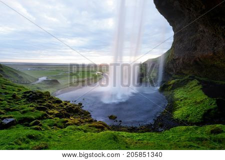 Sunrise on Seljalandfoss waterfall
