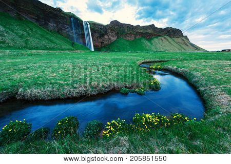 Sunrise on Seljalandfoss waterfall