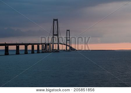 StorebÃÂ¦ltsbroen bridge. The sun is setting