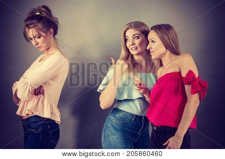 Woman Being Bullied By Two Females
