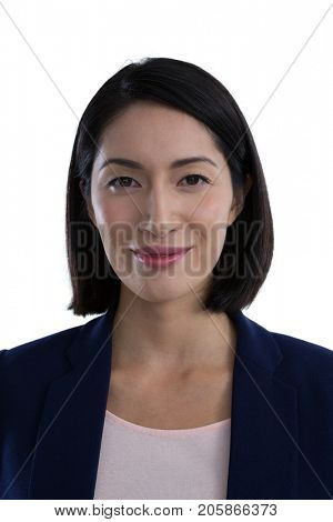 Portrait of confident businesswoman against white background