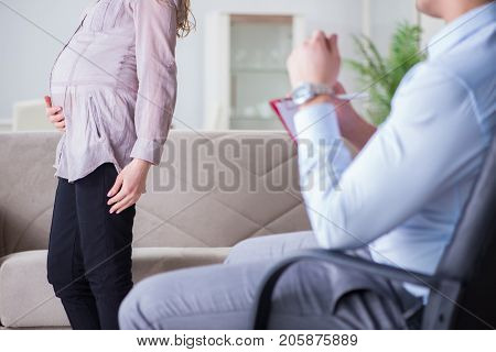 Pregnant woman visiting psychologist doctor