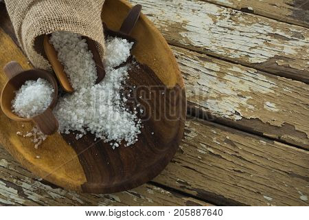 Close-up of sea slat on wooden plate