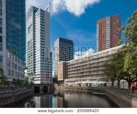 Rotterdam cityscape with canal and skyscraper