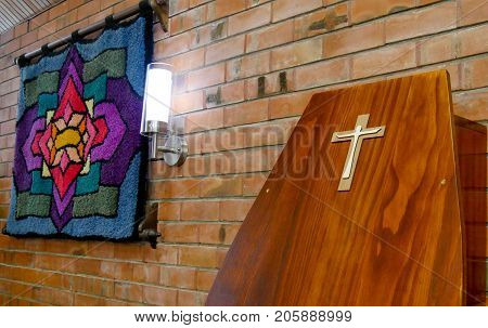 closeup shot of a colorful casket in a hearse or chapel before funeral or burial at cemetery